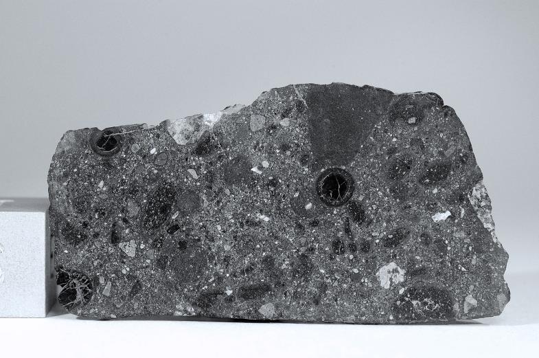 1.942 grams. 0.8 mm thin!   Martian (basaltic breccia).jpg